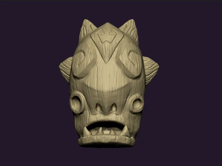A wooden mask in form of creature with open mouth